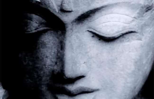 Emmons Taekwondo - A black and white photo of a buddha statue.