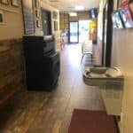 Emmons Taekwondo - A restaurant hallway with a water dispenser and Karate School.